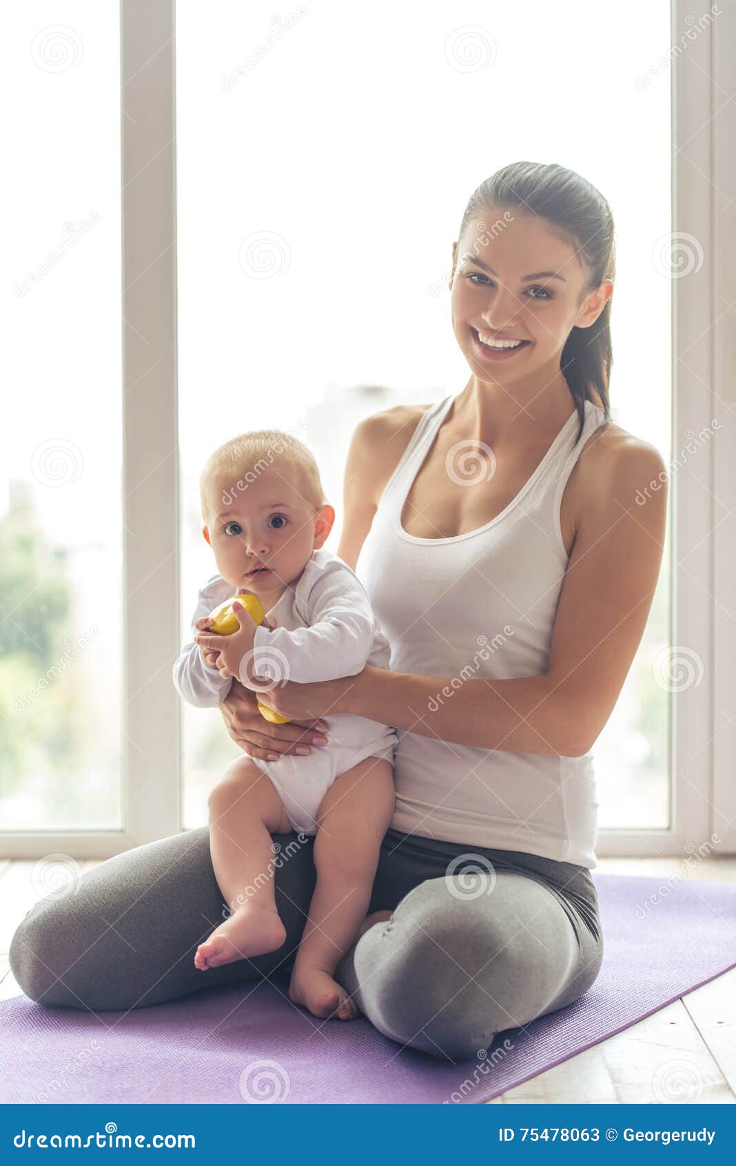 Sporting mom and baby stock image. Image of beautiful - 75478063