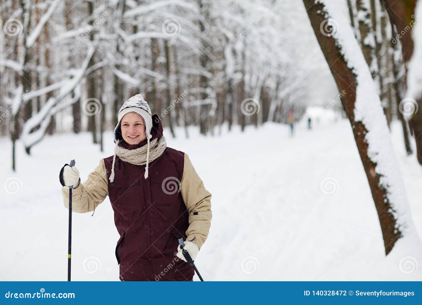 Sportive Man Skiing in Forest Stock Photo - Image of carefree, outdoors ...