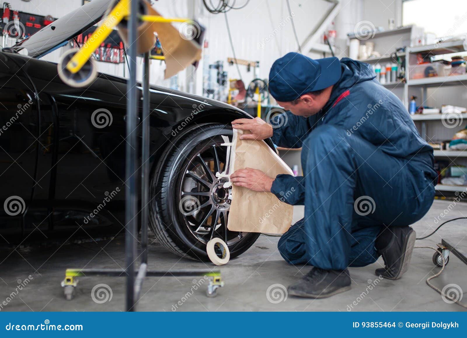 Sports car in a workshop stock photo. Image of garage - 93855464