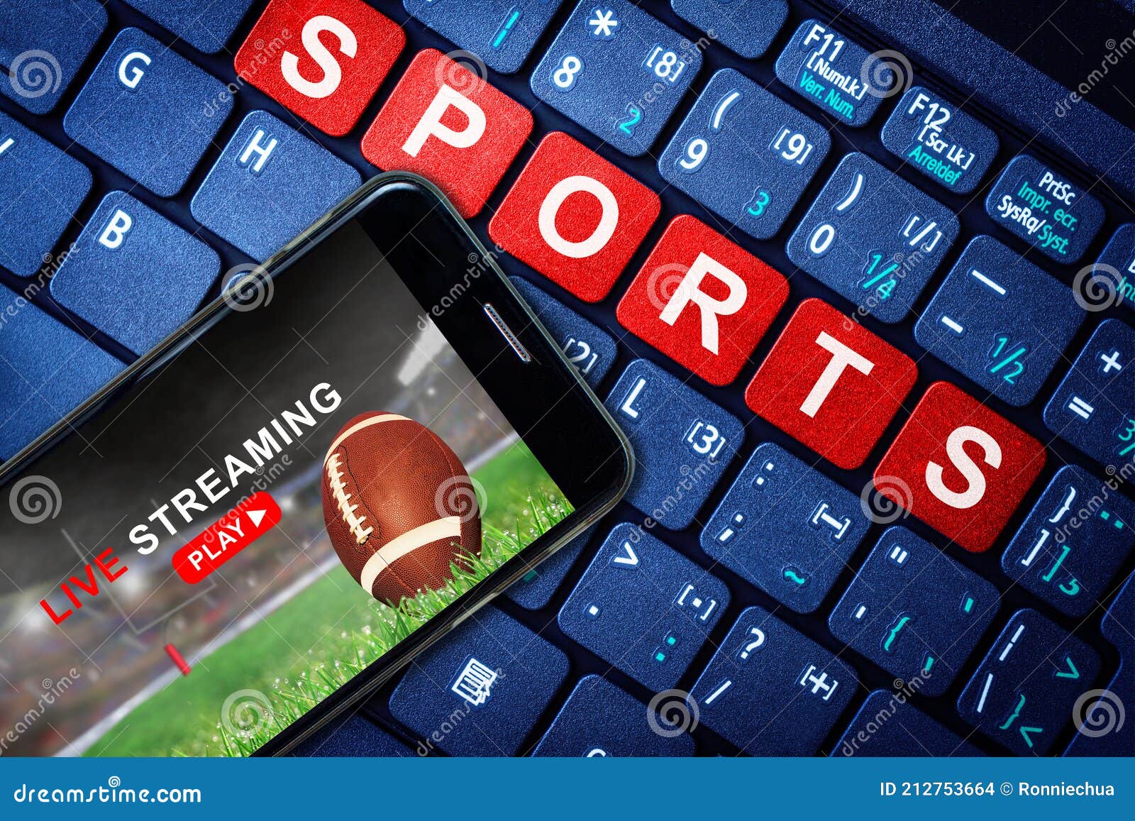 Sports Live Streaming Showing Football Game on Mobile Phone Stock Photo