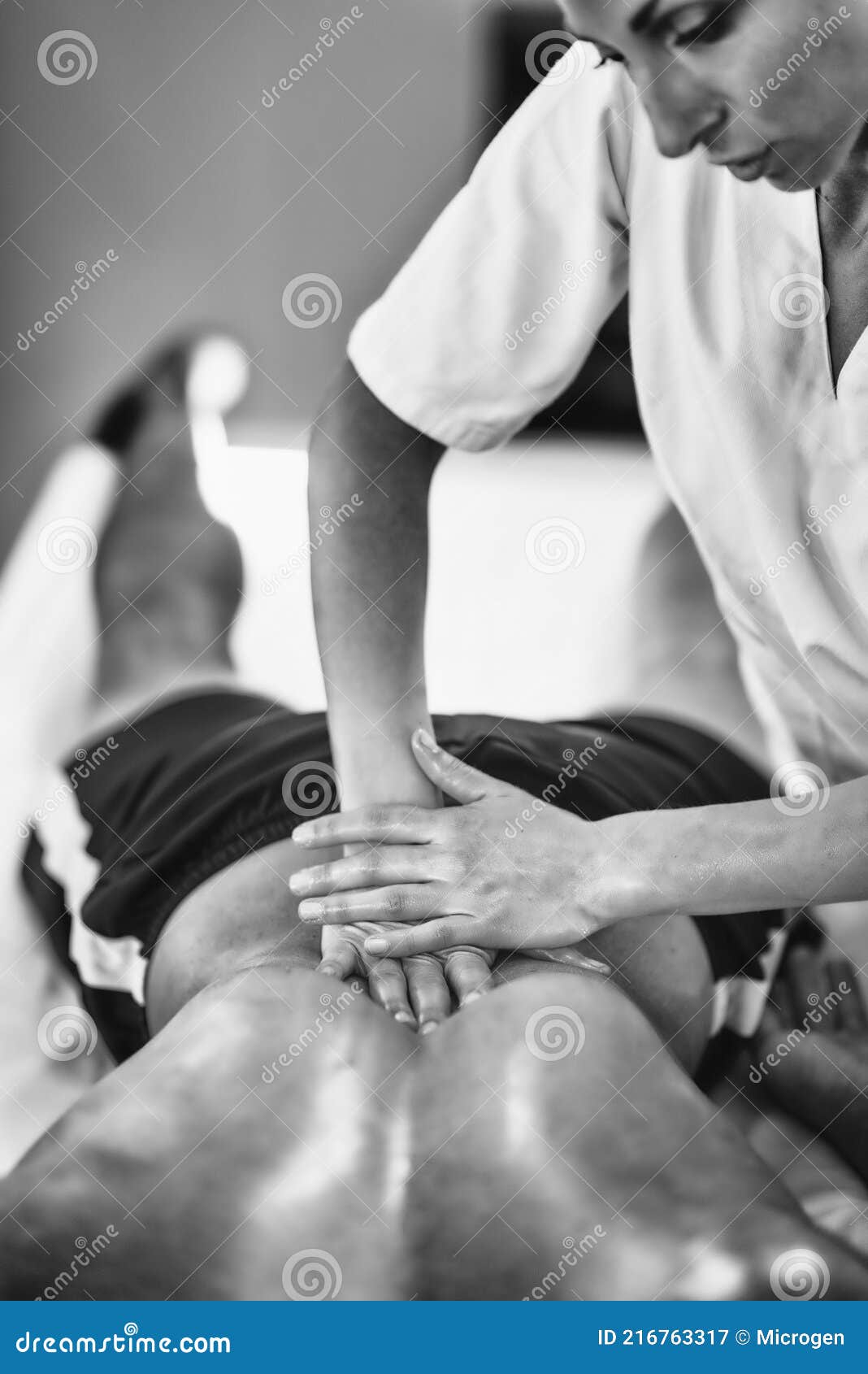 Lower back massage - Stock Image - F024/7790 - Science Photo Library