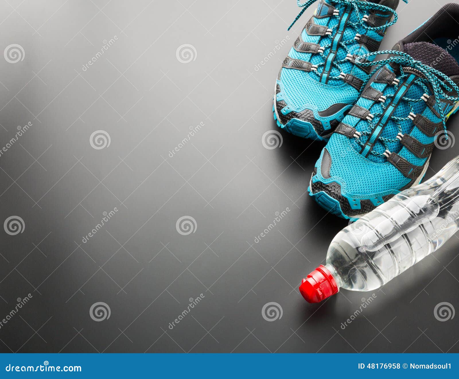 Sports Runners and a Bottle of Water Stock Photo Image of race
