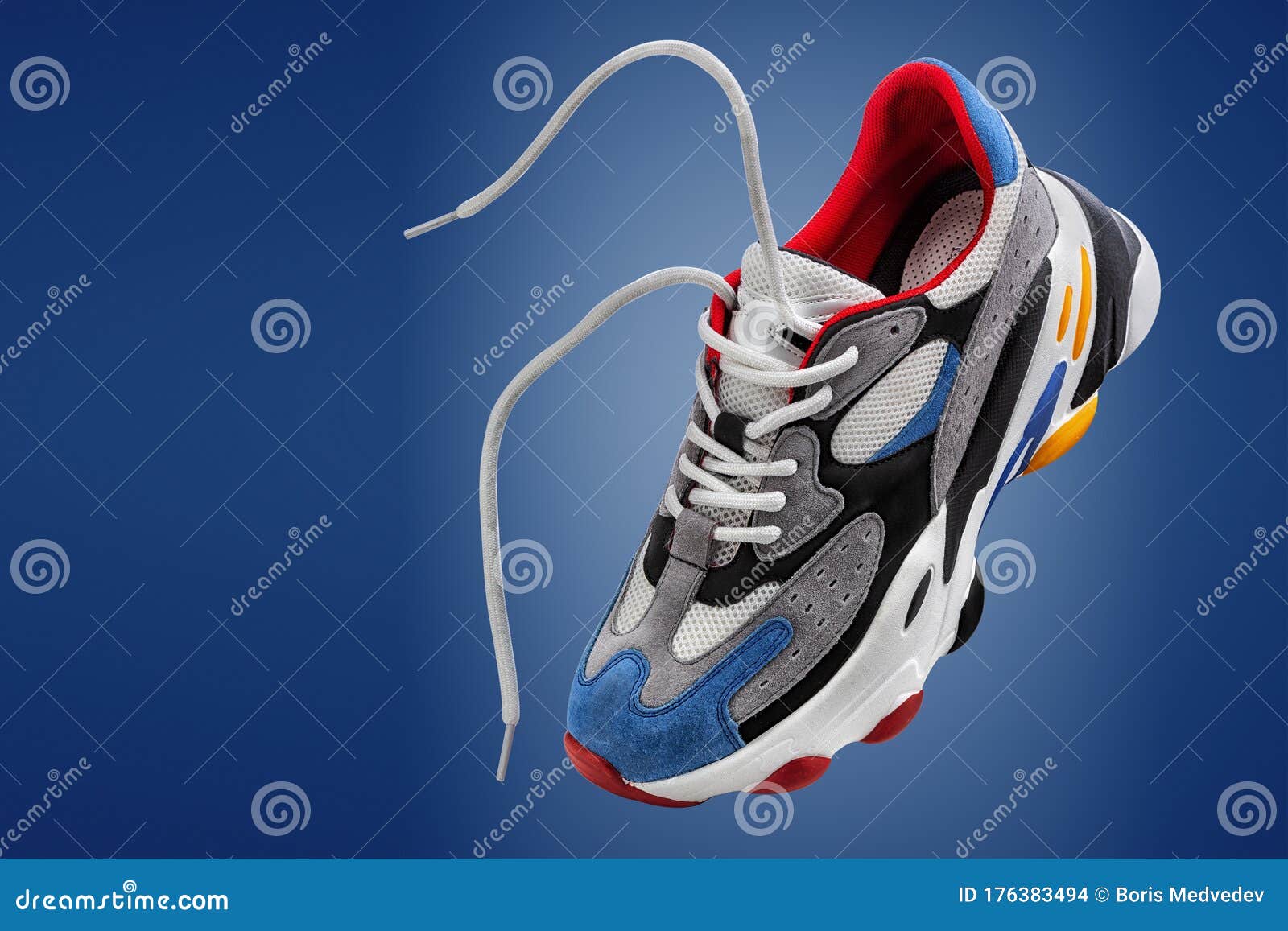 Sports Shoes, Sports Sneakers on a Blue Background with Space for the ...