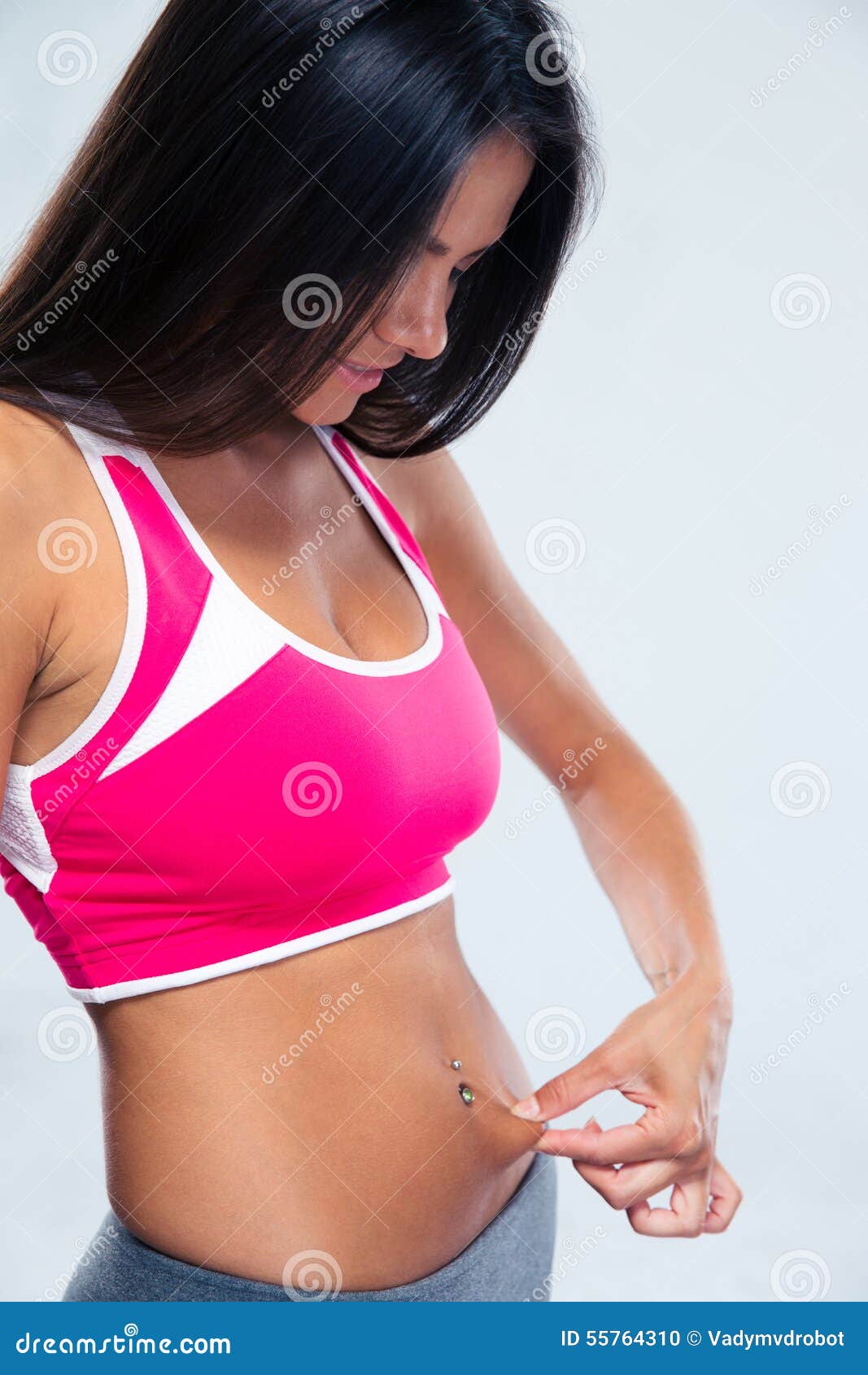 Woman in Underwear Touching Her Belly on White Background, Closeup