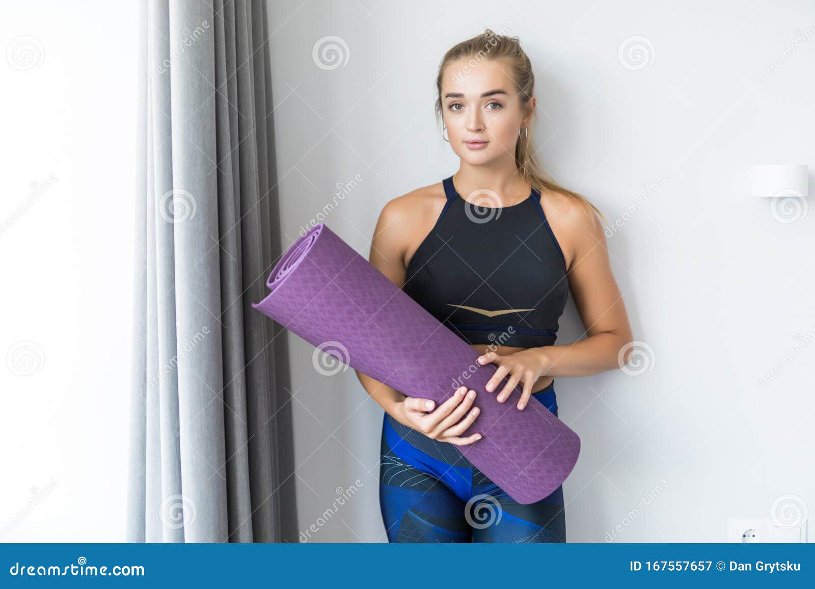 Sporty Attractive Slim Woman Holding Yoga Mat before or after Fitness  Class. Active Yogi Girl Ready for Yoga and Sport Exercise To Stock Image -  Image of exercise, asian: 167557657