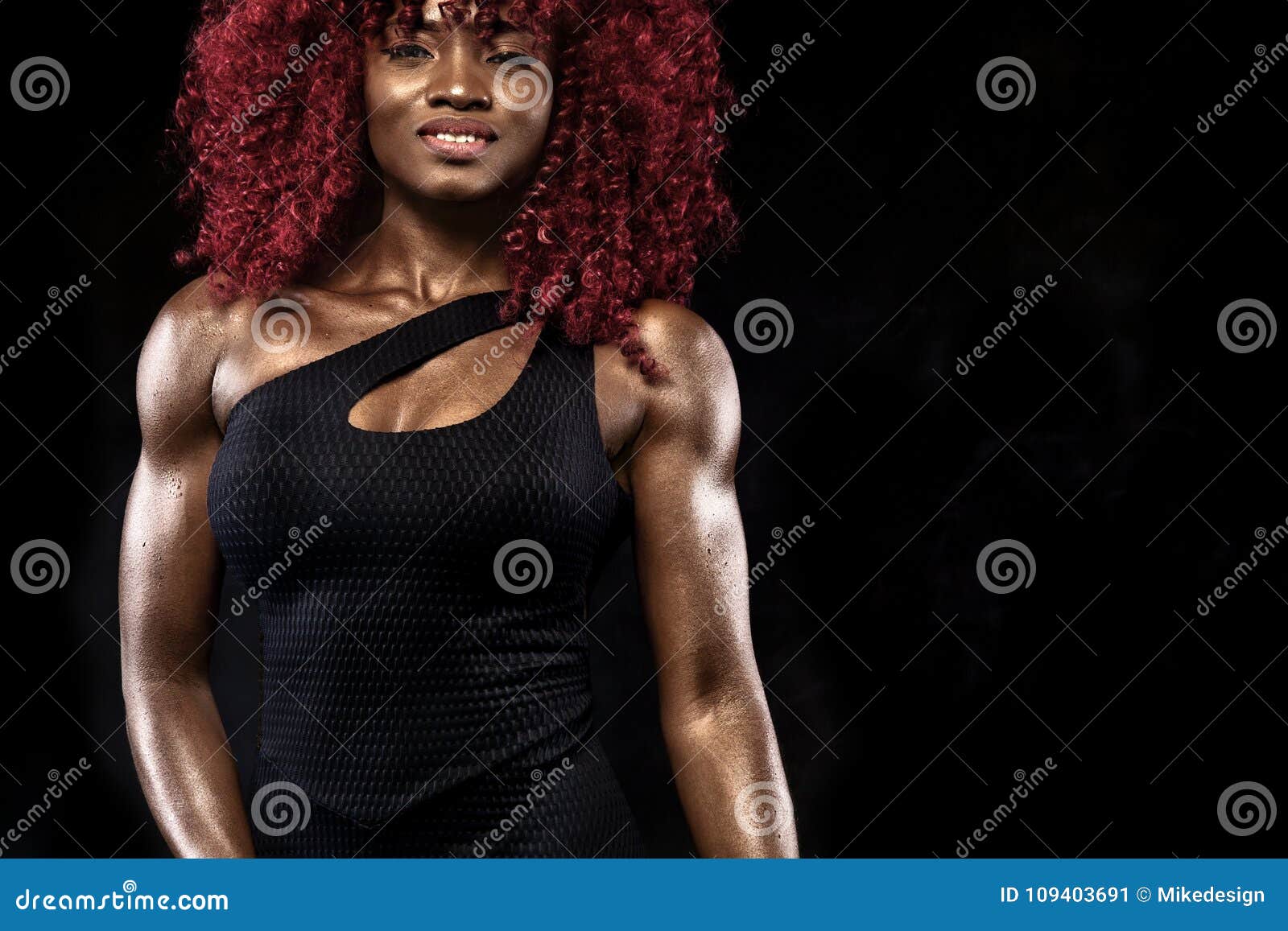Sporty Beautiful Afro american Model, Woman in Sportwear Makes Fitness