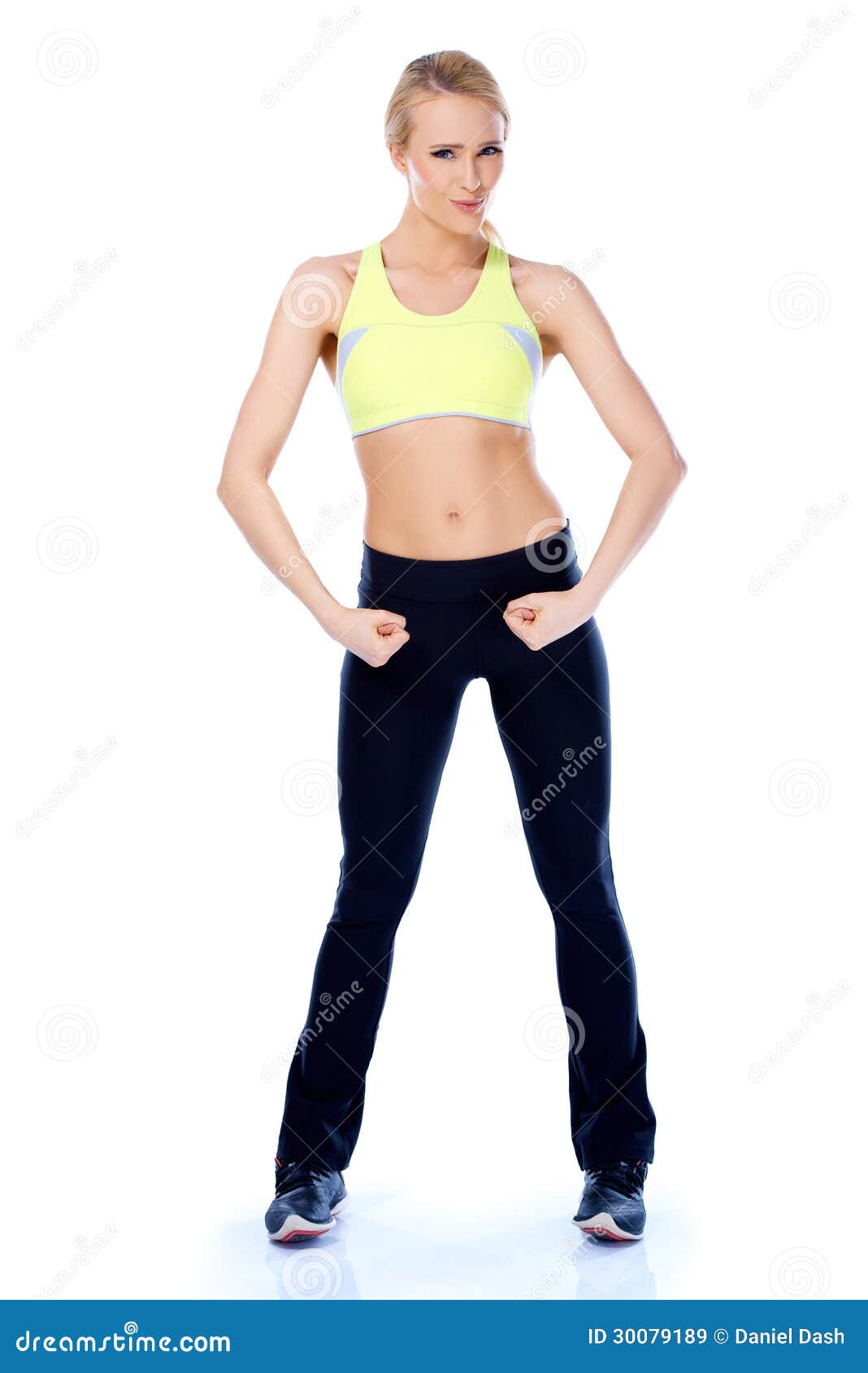 Confident Sporty Woman Flexing Muscles On Beach. Beautiful Young