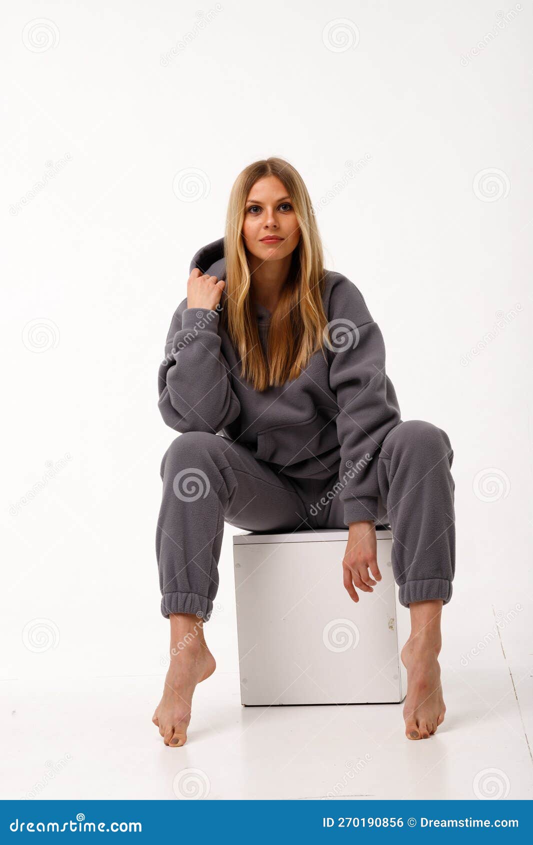 Sporty Blonde Girl in Thermal Clothing for Women Stock Photo