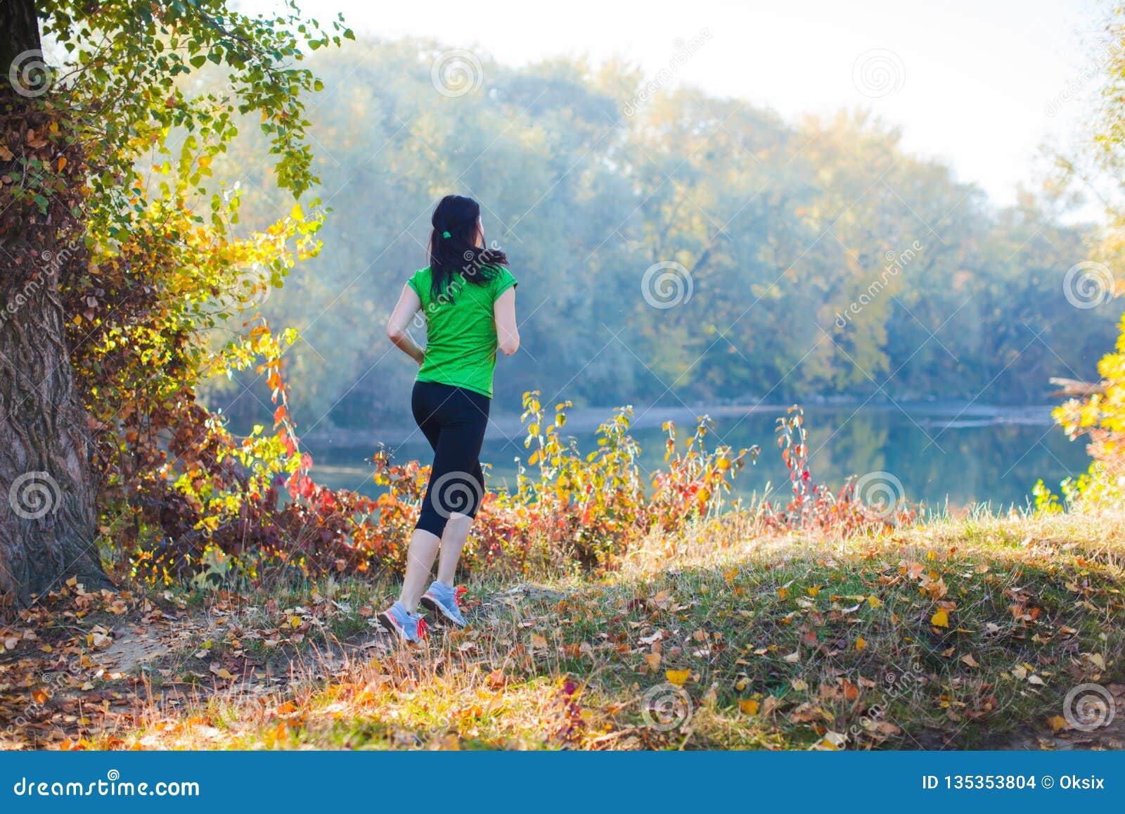 Sporty Girl Running on the Pathway in the Forest Stock Photo - Image of ...