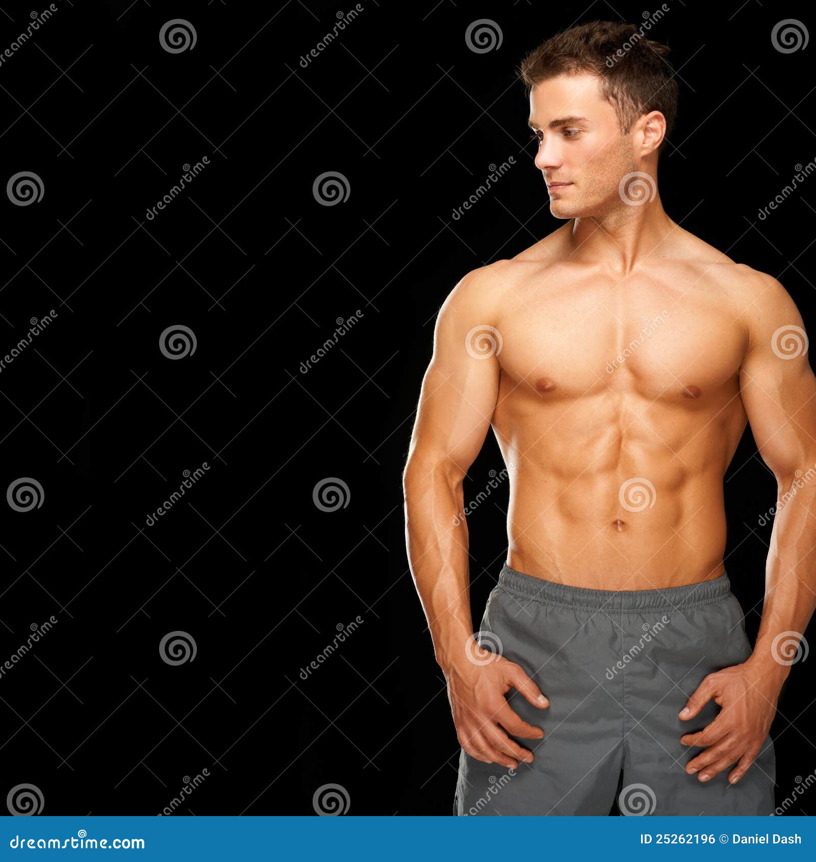 sporty and healthy muscular man  on black