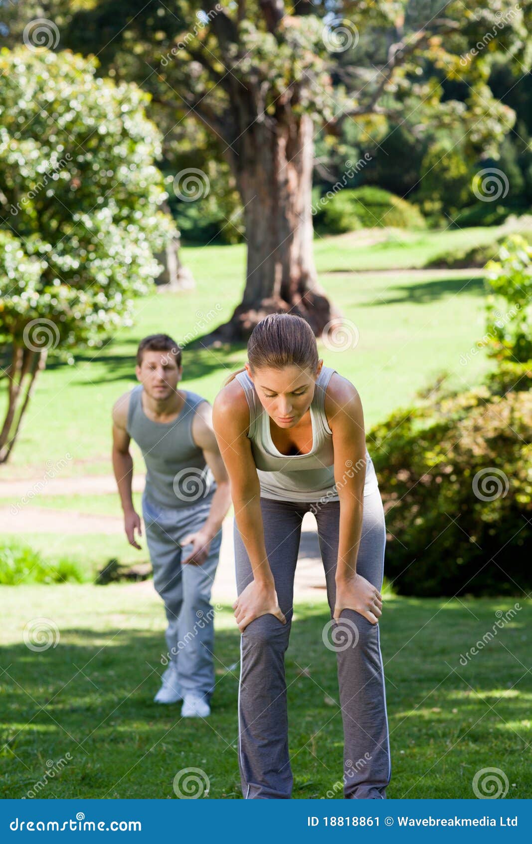Sporty lovers in the park stock image. Image of outfit 18818861