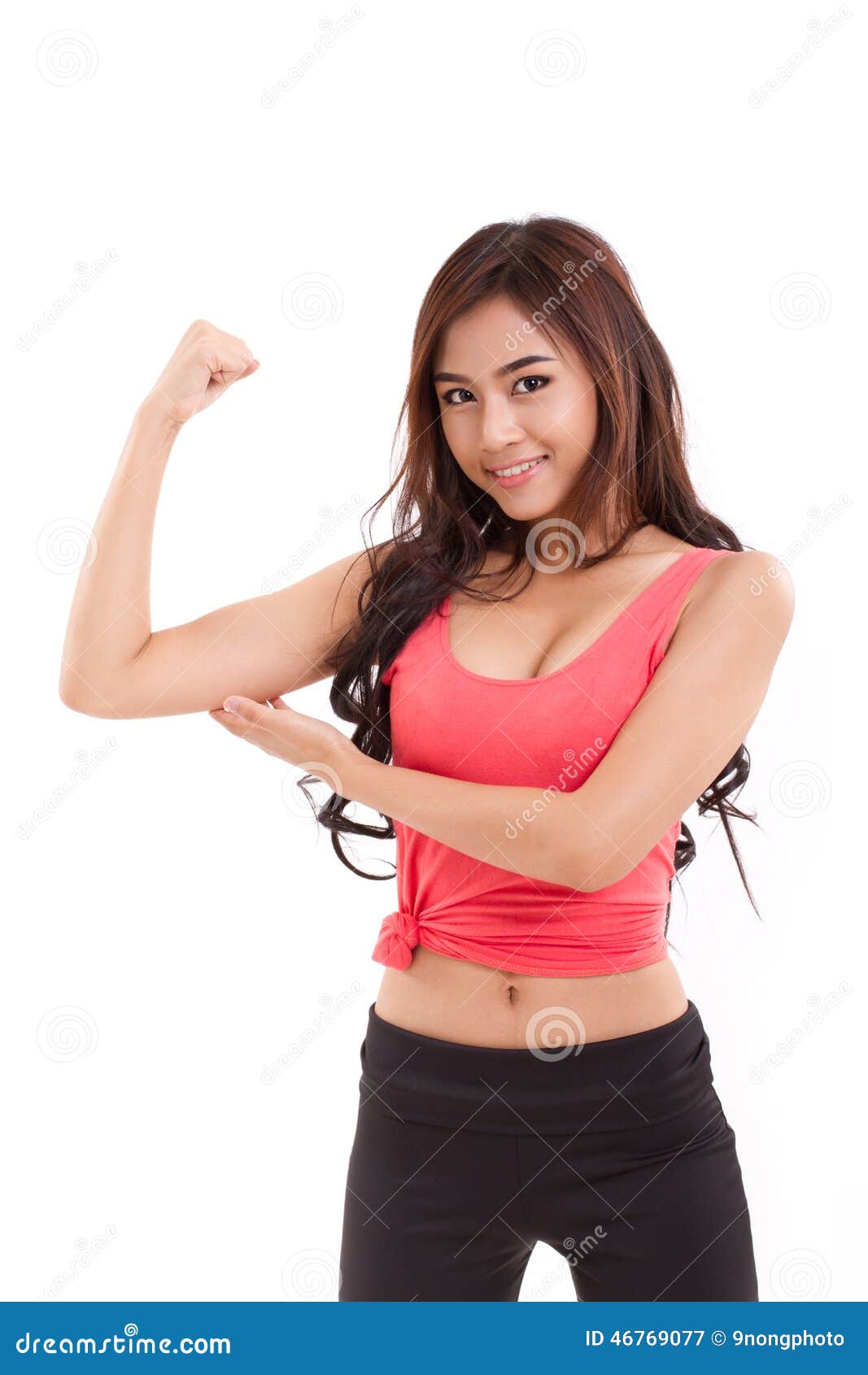 Sporty Woman Showing Checking Her Biceps Arm Muscle Stock