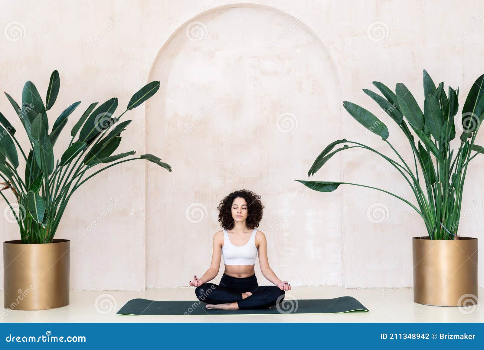 Group of People Meditation Making Sitting Yoga Pose in Luxury