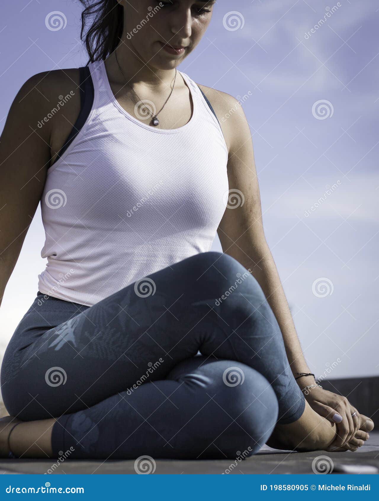 Sporty Young Woman Doing Yoga Exercises Using a Gym Mat Along the Beach in  Lisbon, Portugal. Playful Woman Working As Freelance Stock Image - Image of  hobbies, mindfulness: 198580905