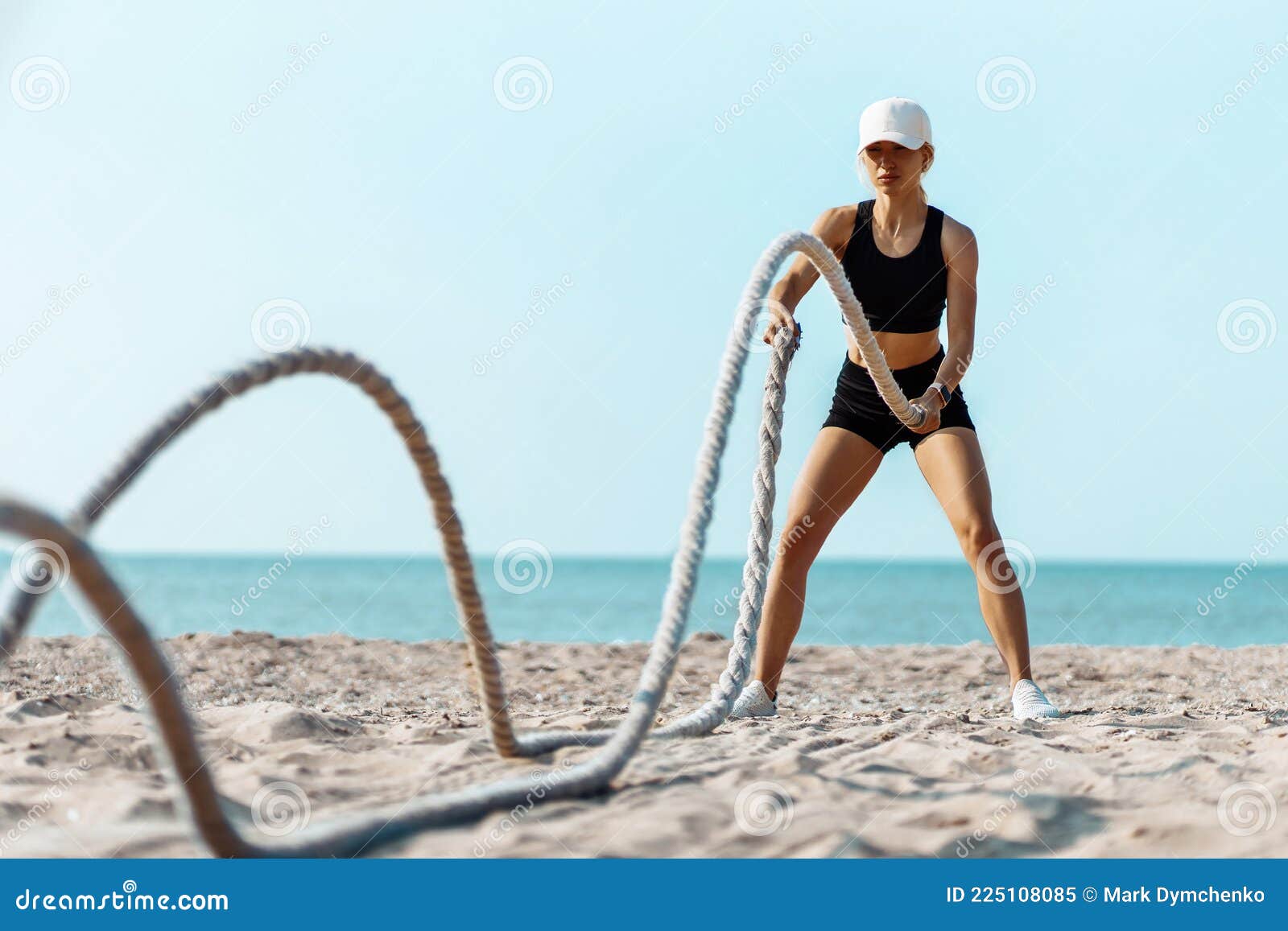 Sporty Young Woman, Man Doing Fitness Workout On The Beach On A Sunny Day,  Using Two Fighting Ropes On The Beach Stock Image - Image Of Movement, Rope:  225108085