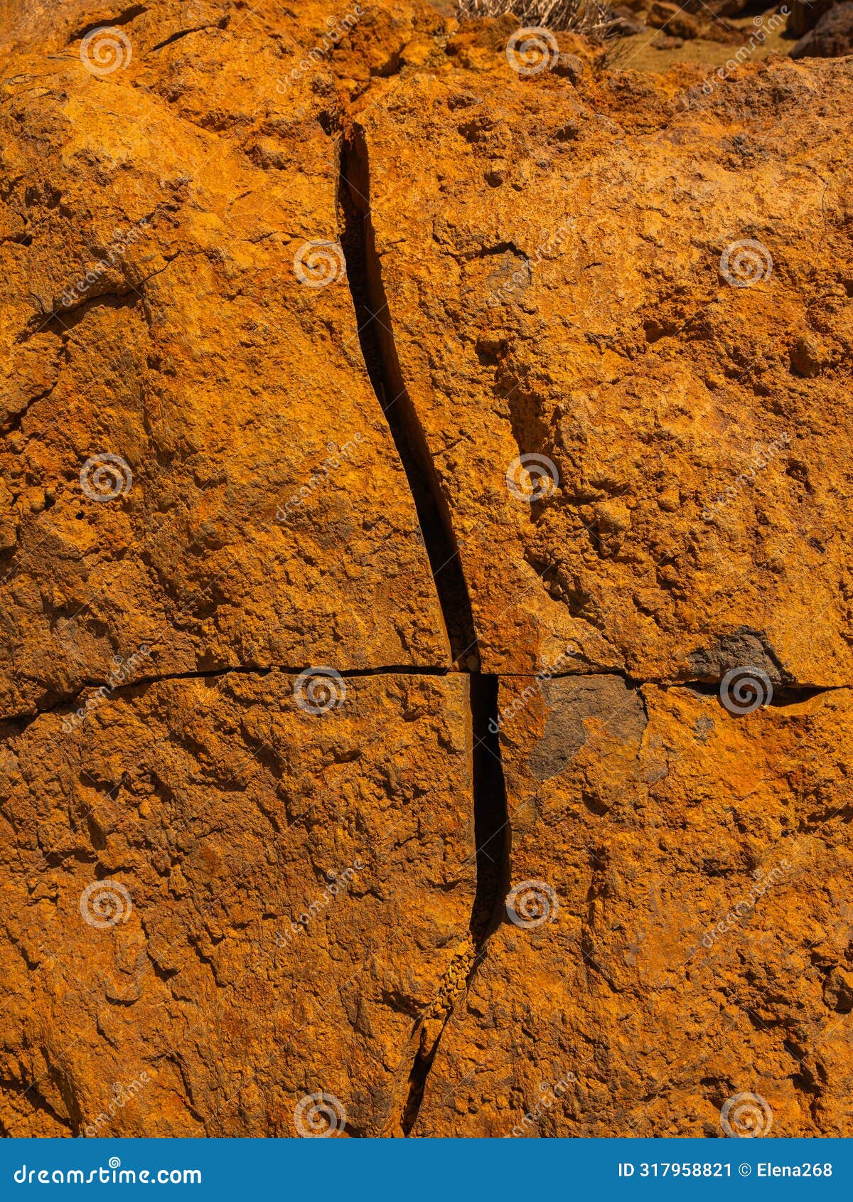 spot in tenerife with many red rocks and beautiful mountain landscape background