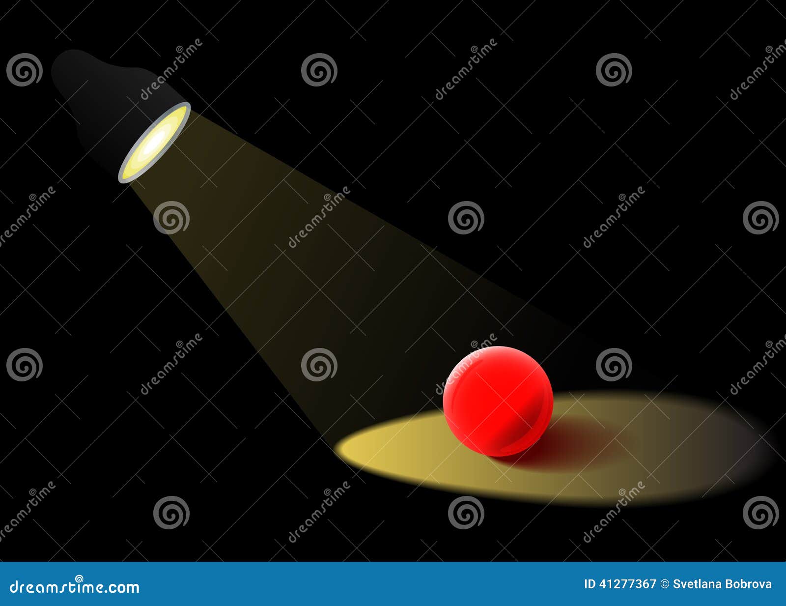 spotlight illuminates red glass ball