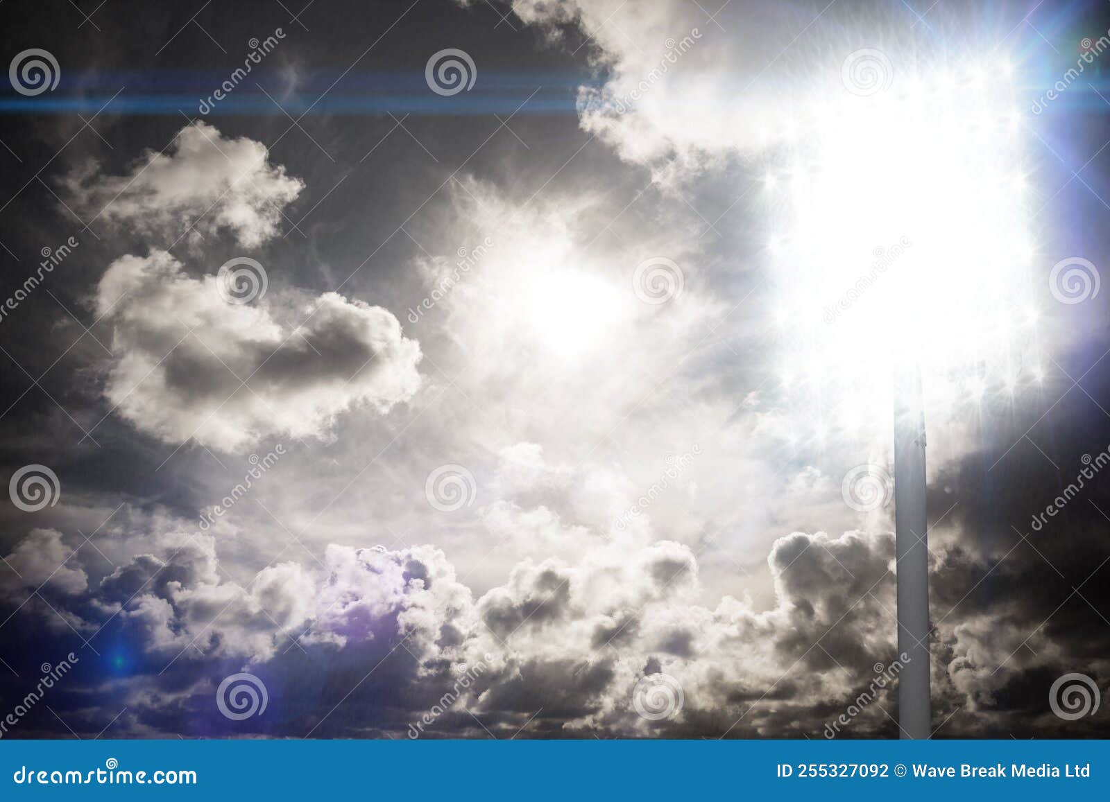Spotlight in sky stock photo. Image of bright, clouds 255327092