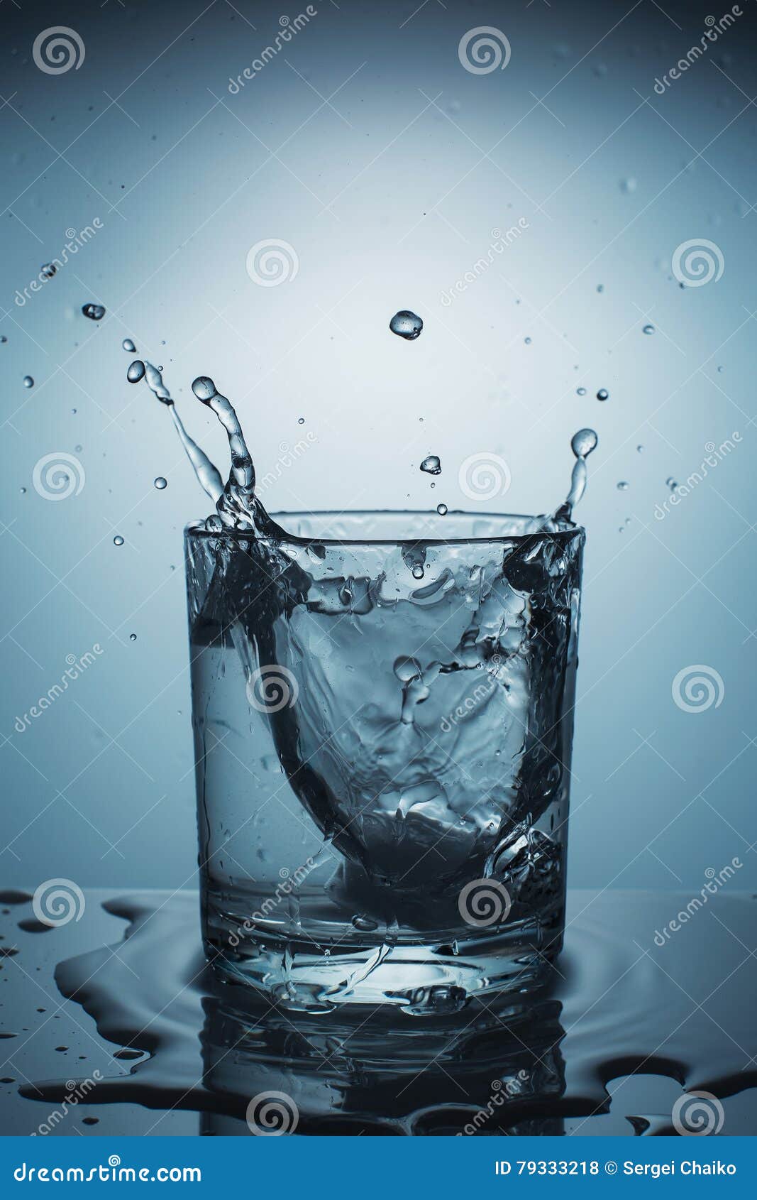 Spray in a glass of water stock photo. Image of care 79333218