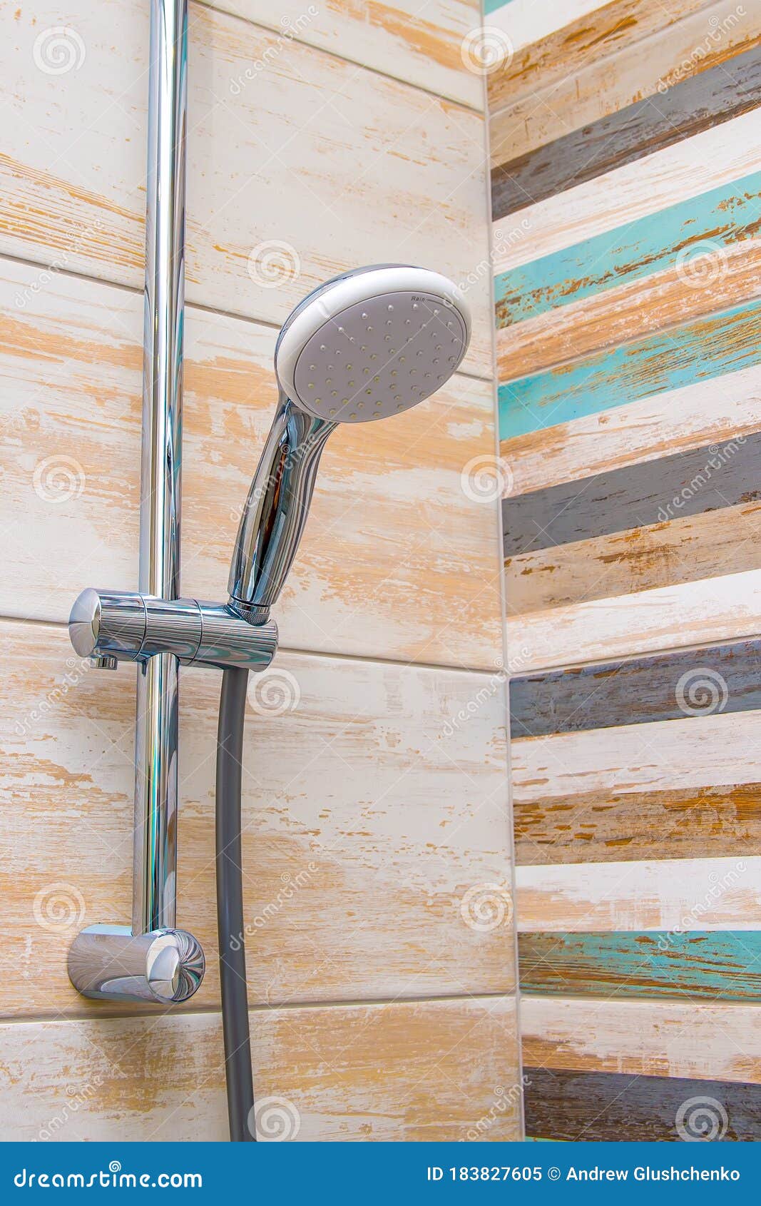 The Spray Gun in the Bathroom is Hanging on the Wall Stock Image