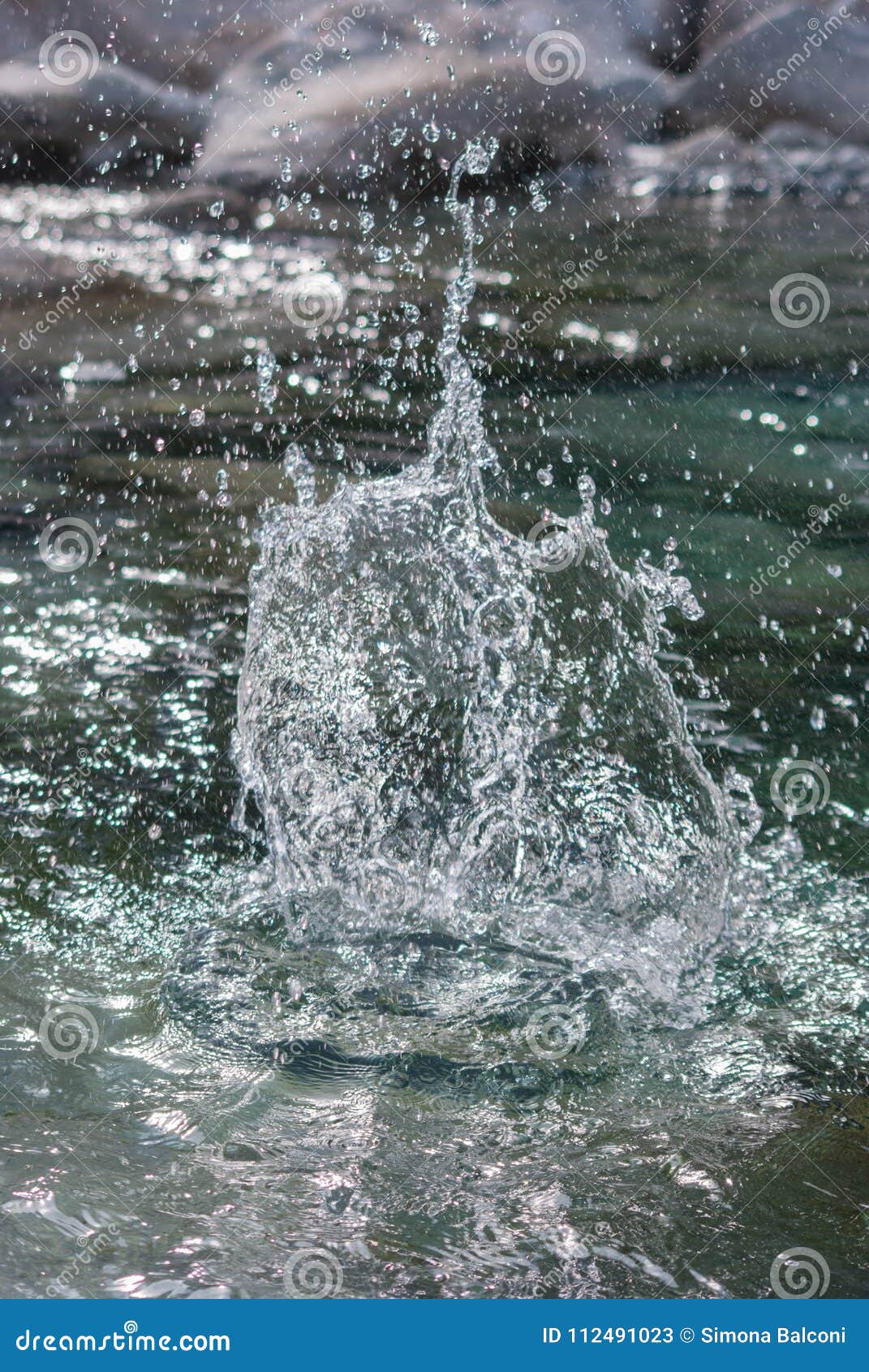 Spray of a Stone Thrown into a Mountain River Rises from a Pere Stock ...