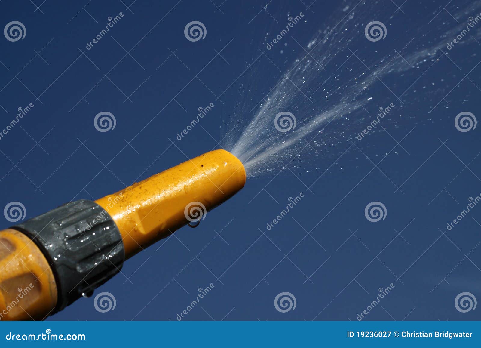 Spraying water stock image. Image of blue, spraying, watering 19236027