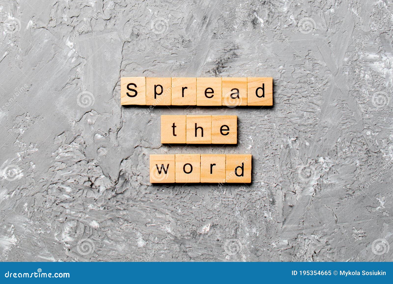 spread the word word written on wood block. spread the word text on table, concept