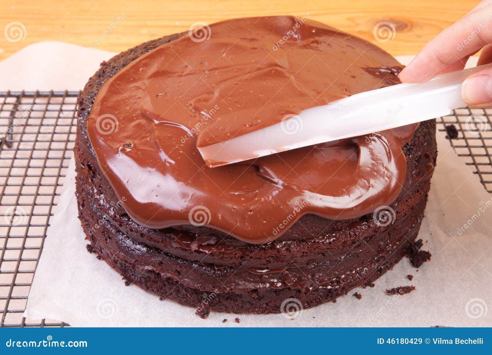 Spreading Chocolate Ganache on the Cake Stock Image Image of close