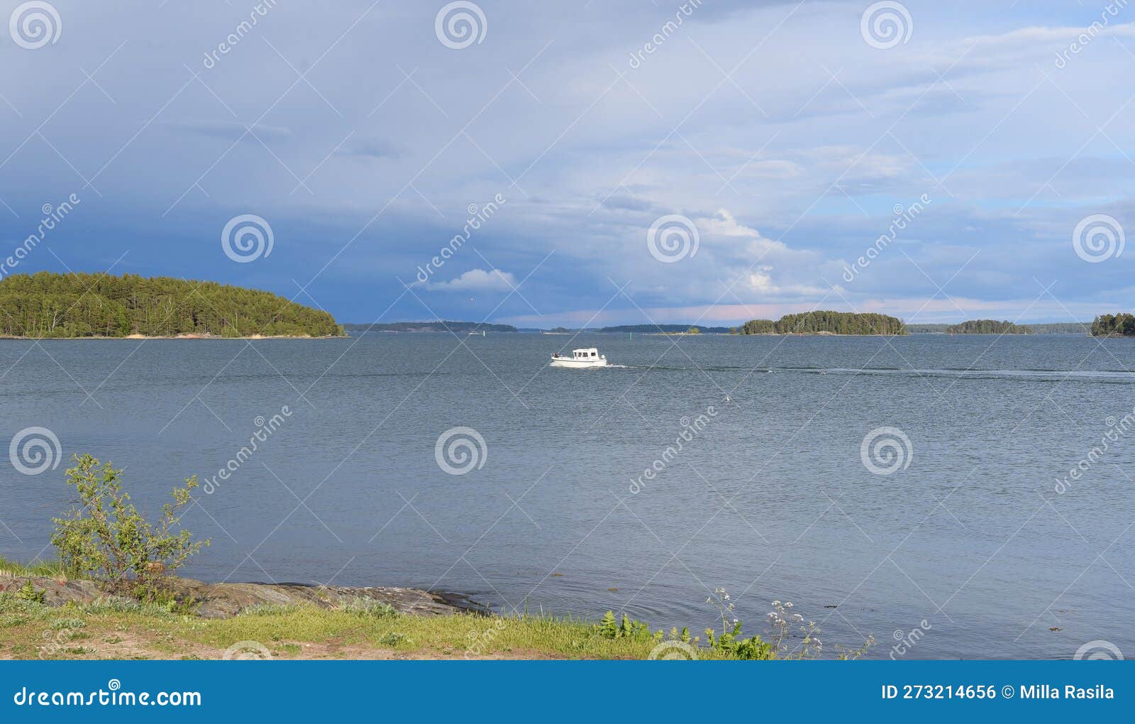 Spring in the Archipelago with Rain Clouds and Sun Stock Photo Image