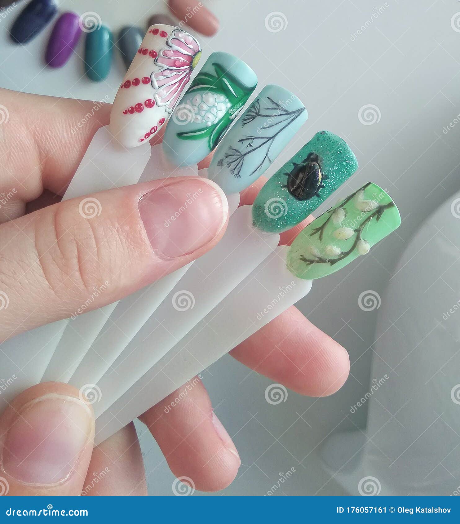 Spring Designs on Tips. Drawings on Manicure Tips of Green Color on the Background of a White Working Manicure Table. Stock Image - Image of designs, background: 176057161 Spring Designs on Tips. Drawings on Manicure Tips of Green Color on the Background of a White Working Manicure Table. Stock Image - Image of designs, background: 176057161