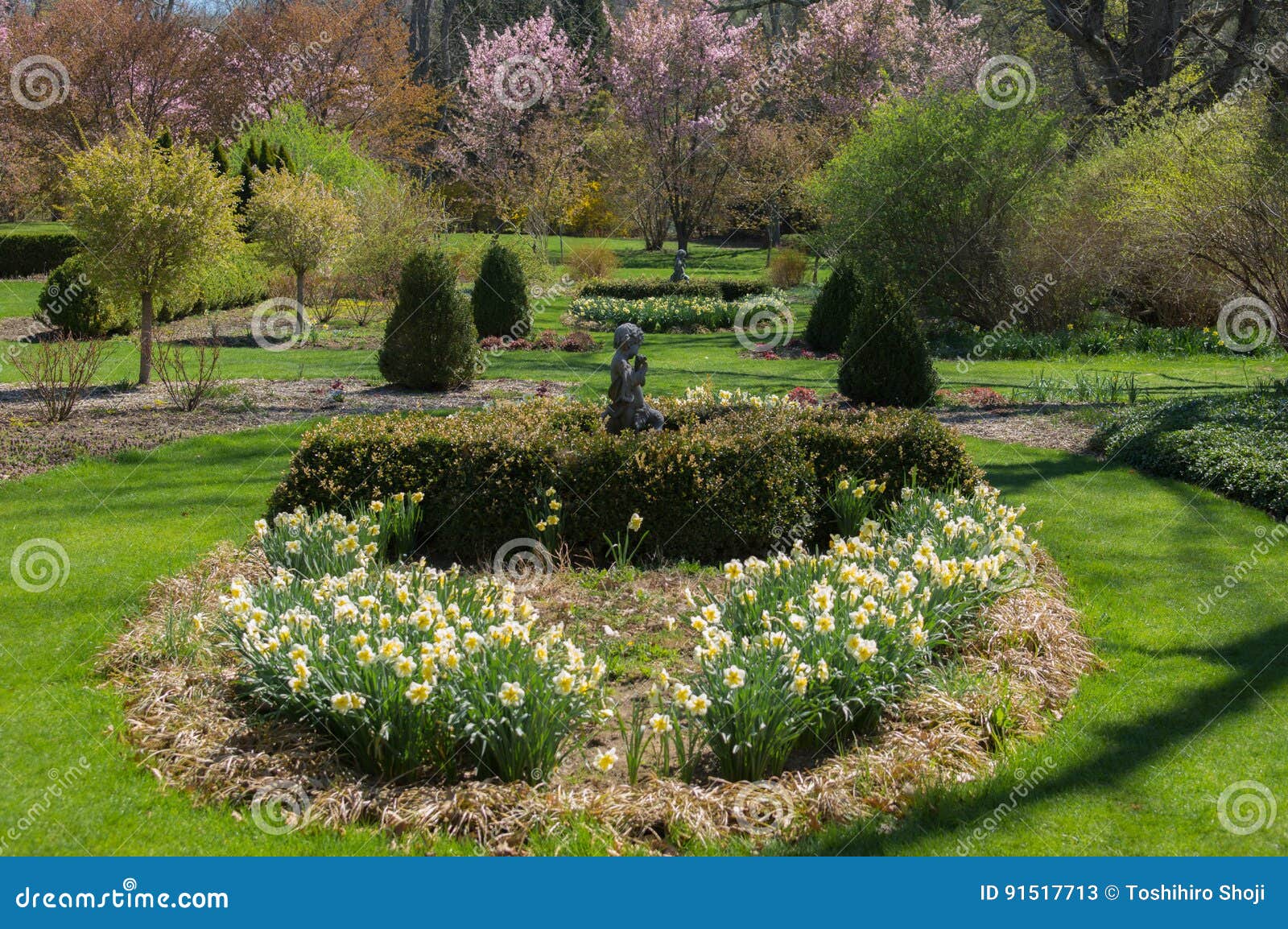 Springtime Flowers With Statues Stock Image Image Of Botanical