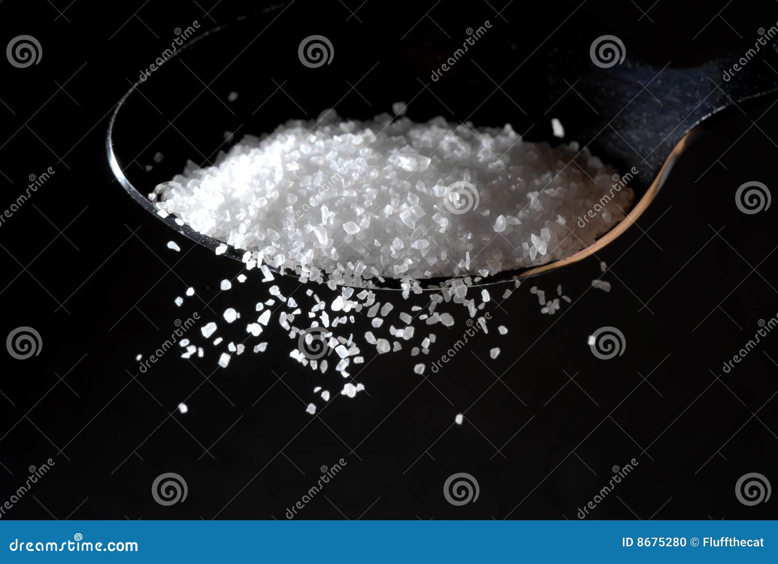 a sprinkle of salt from a spoon