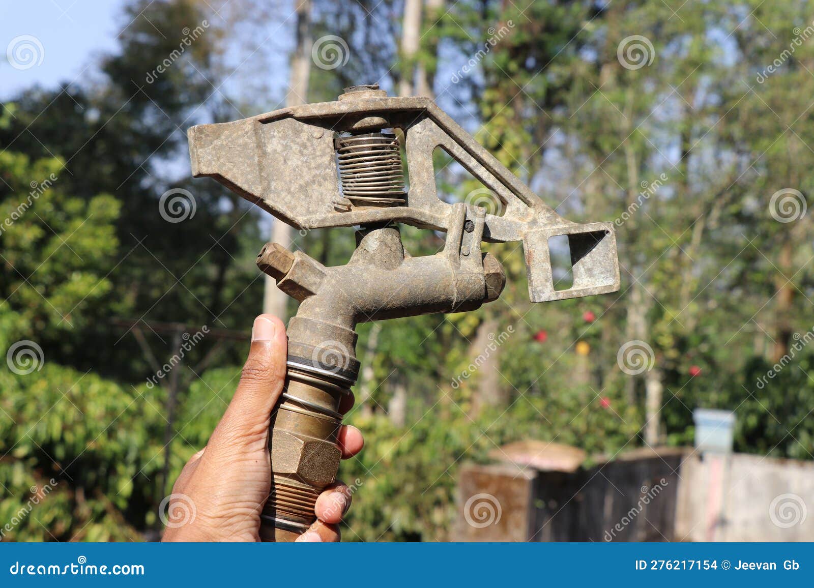 Sprinkler Jet Also Knows As Impact Sprinkler Part Held in the Hand