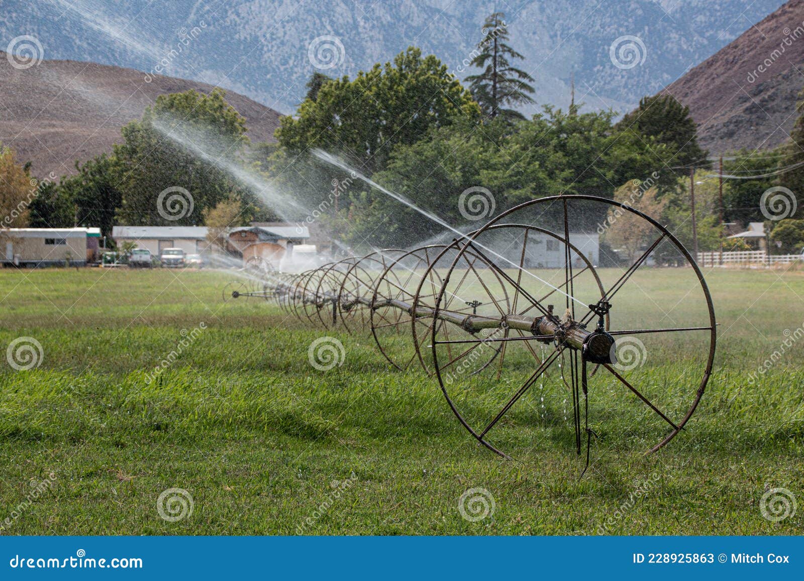 Field Sprinklers stock image. Image of pasture, wheels 228925863