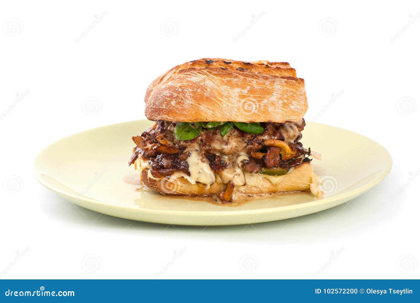 A Square Burger with Mushrooms Chanterelles in a Rustic Style on Stock