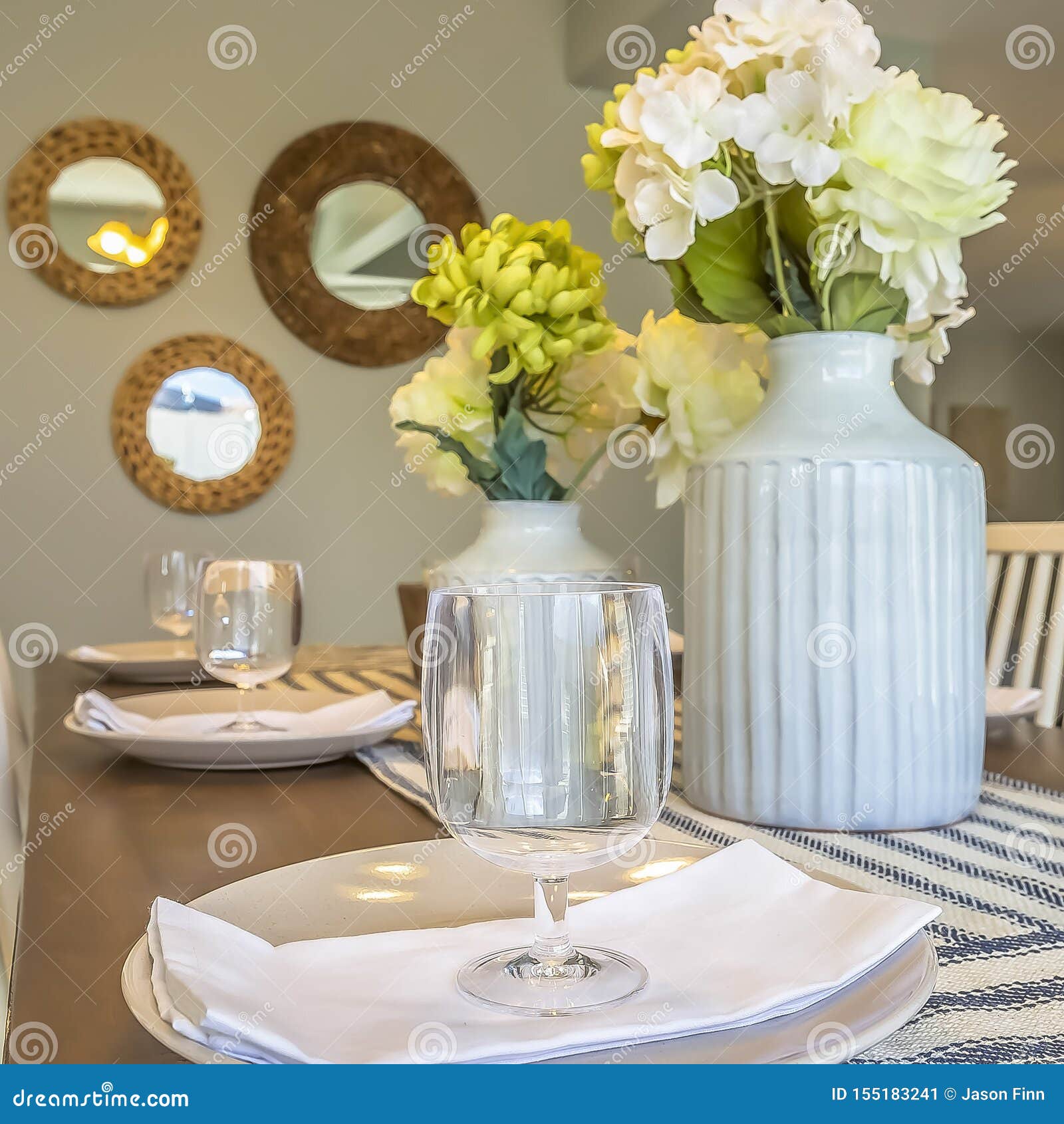 Square Frame Dinner Setting Inside the Dining Room of a Home with