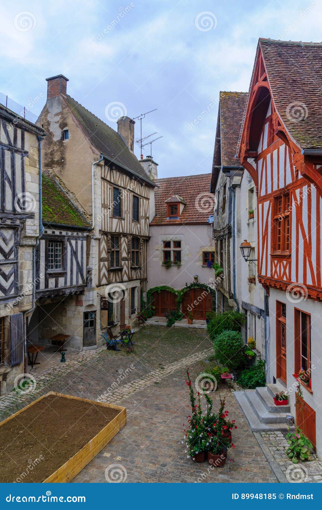 square with half-timbered houses, in the medieval village noyers-sur-serein