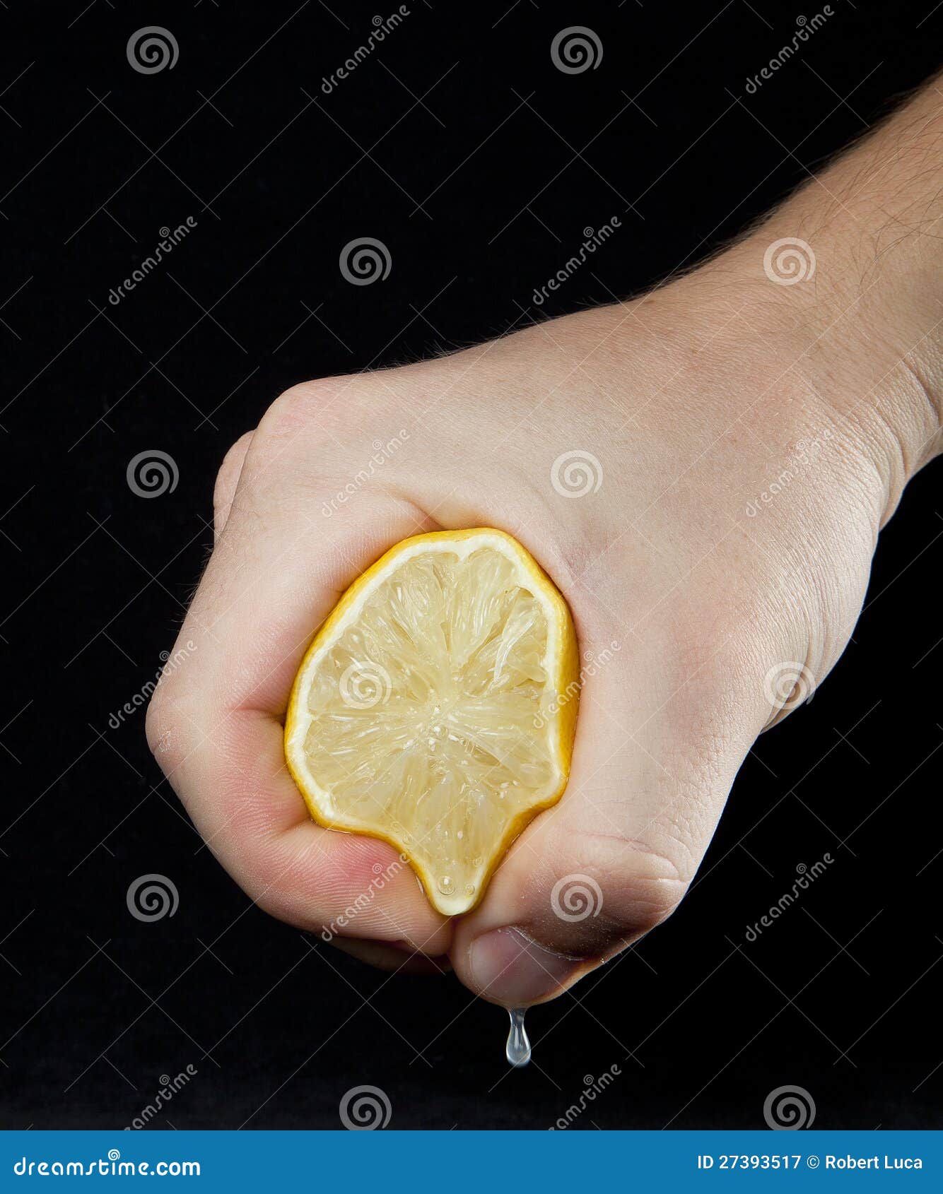 Squeezing lemon in hand stock image. Image of drip, hand 27393517