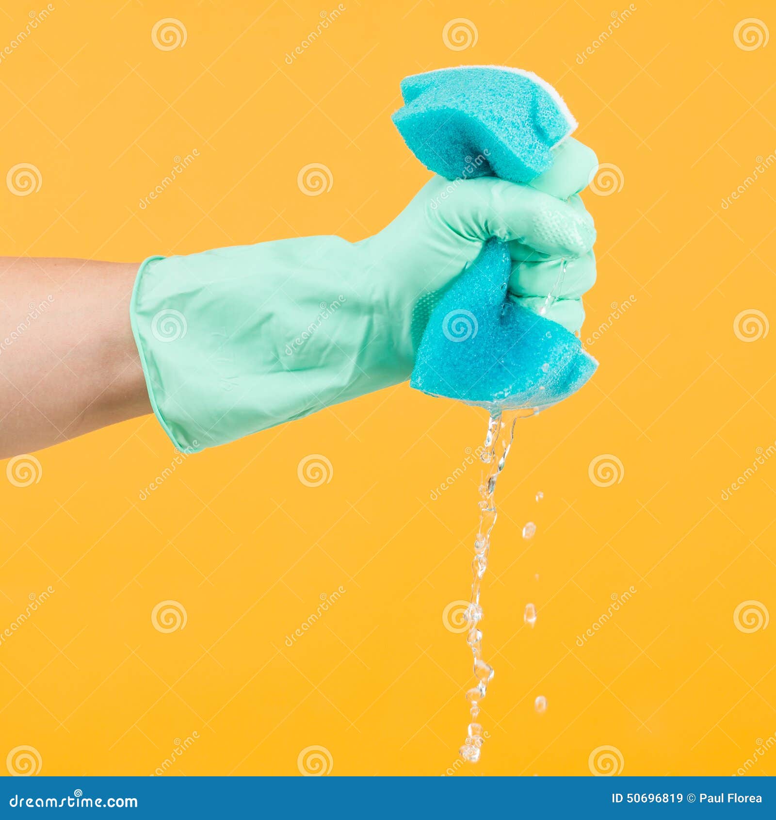 Squeezing wet sponge stock image. Image of chore, cleaning 50696819