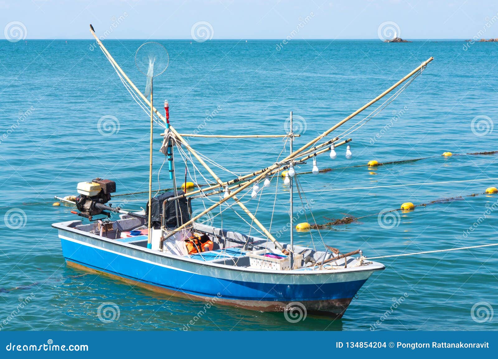 Squid Hunting Ship Float in Blue Sea Stock Photo - Image of
