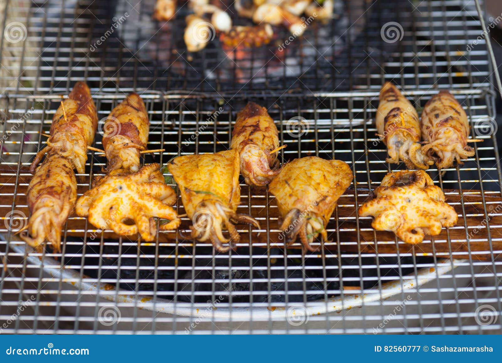 Squid and Octopus Fried with Spices on Grill Stock Image Image of