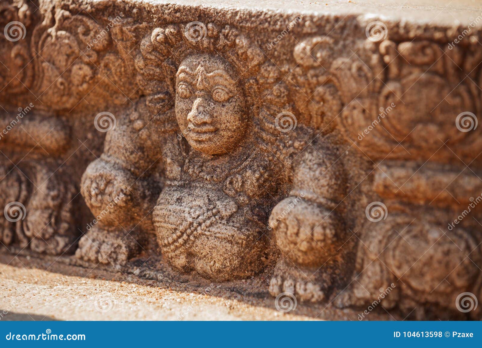 sri lanka, anuradhapura. mythological character on stone wall of