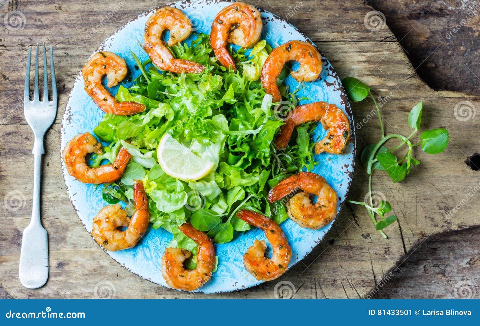 Srimp Lettuce Salad On Blue Plate Wooden Rustic Background Stock Image