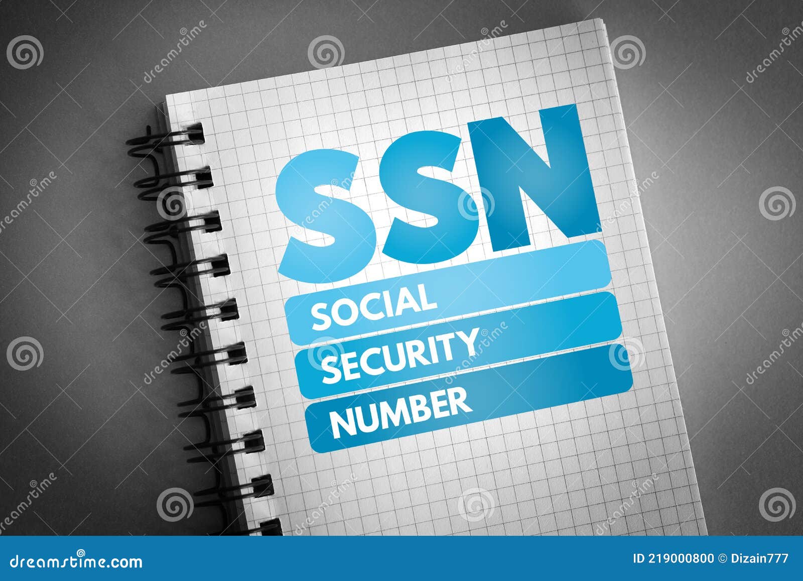 ssn - social security number acronym on notepad, concept background
