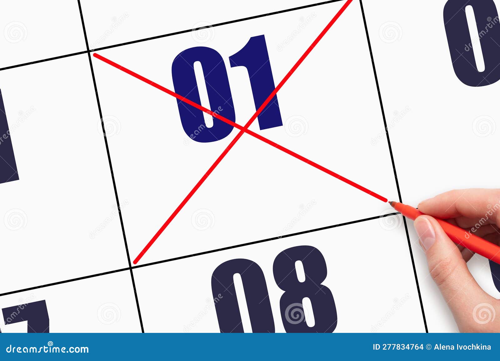 1st Day of the Month. Hand Crossing Out Calendar Date Stock Photo