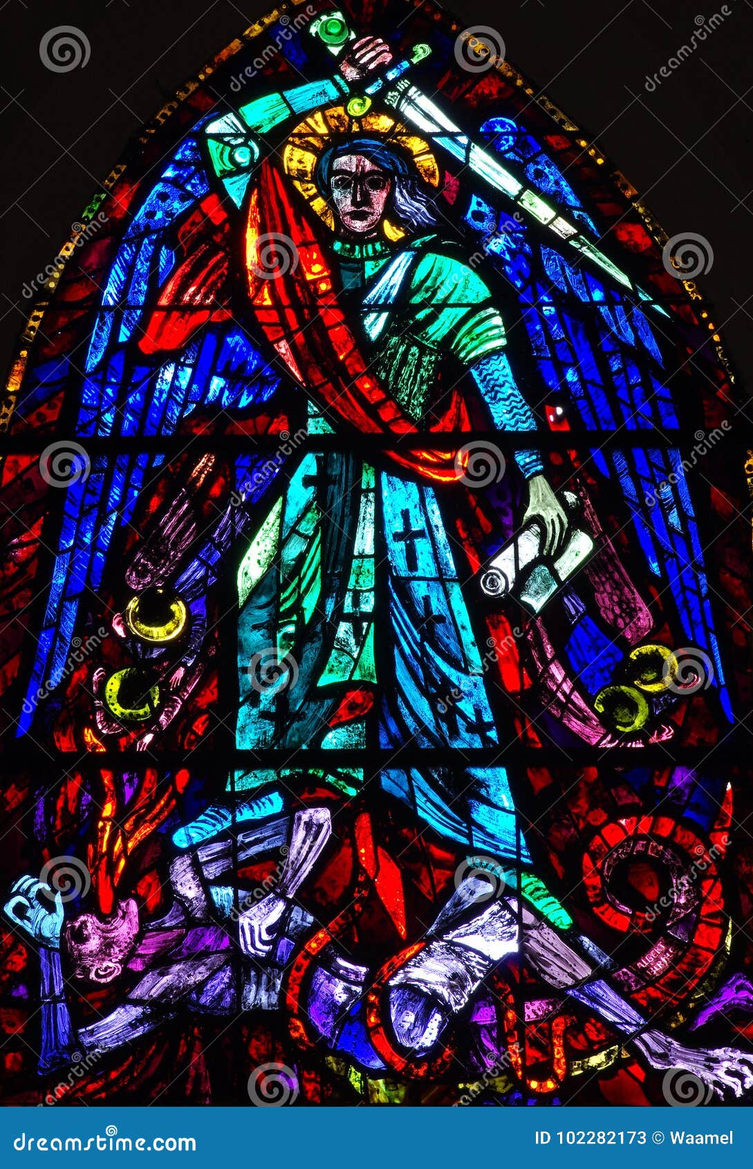 st. michael conquers evil stained glass