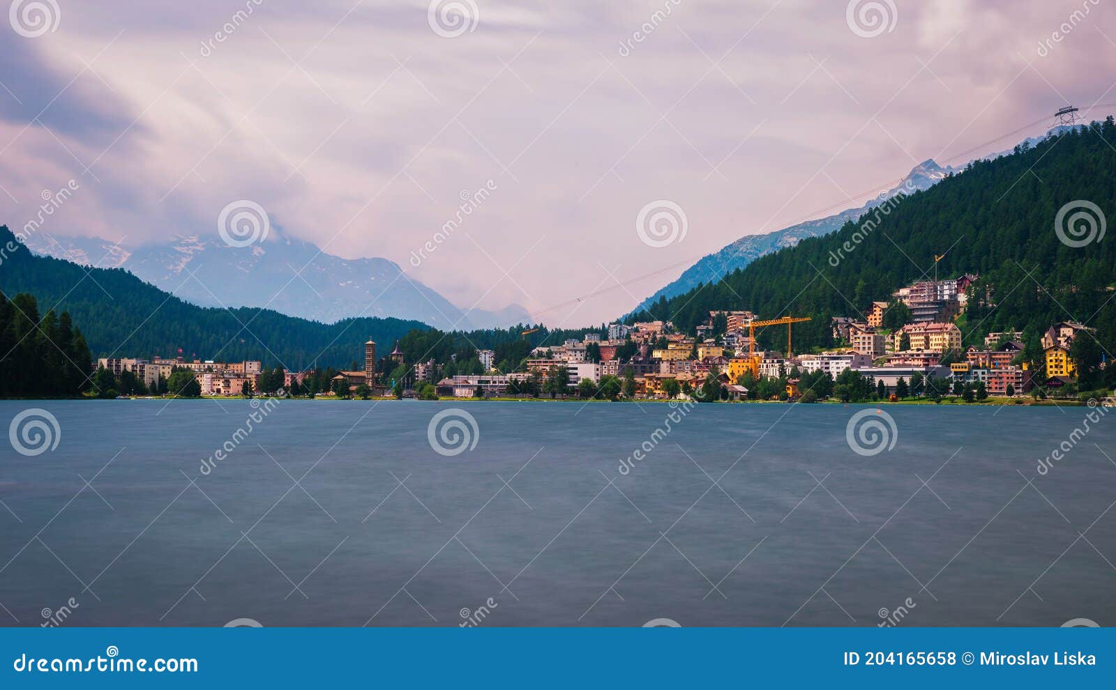 st. moritz with lake called st. moritzsee and swiss alps in engadin, switzerland