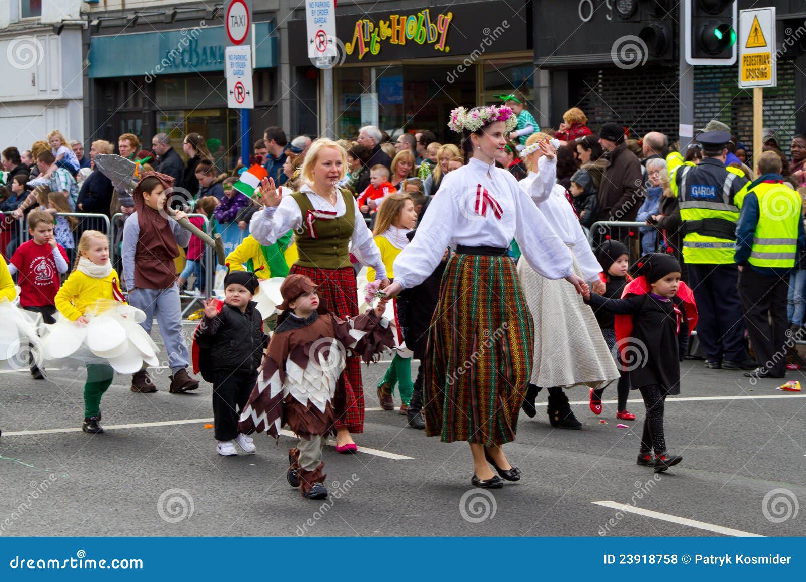 St. Patrick s Day parade in Limerick. LIMERICK, IRELAND - MARCH 17: Unidentified people participate in a parade for St. Patrick s Day. It s a traditional Irish holiday celebration.