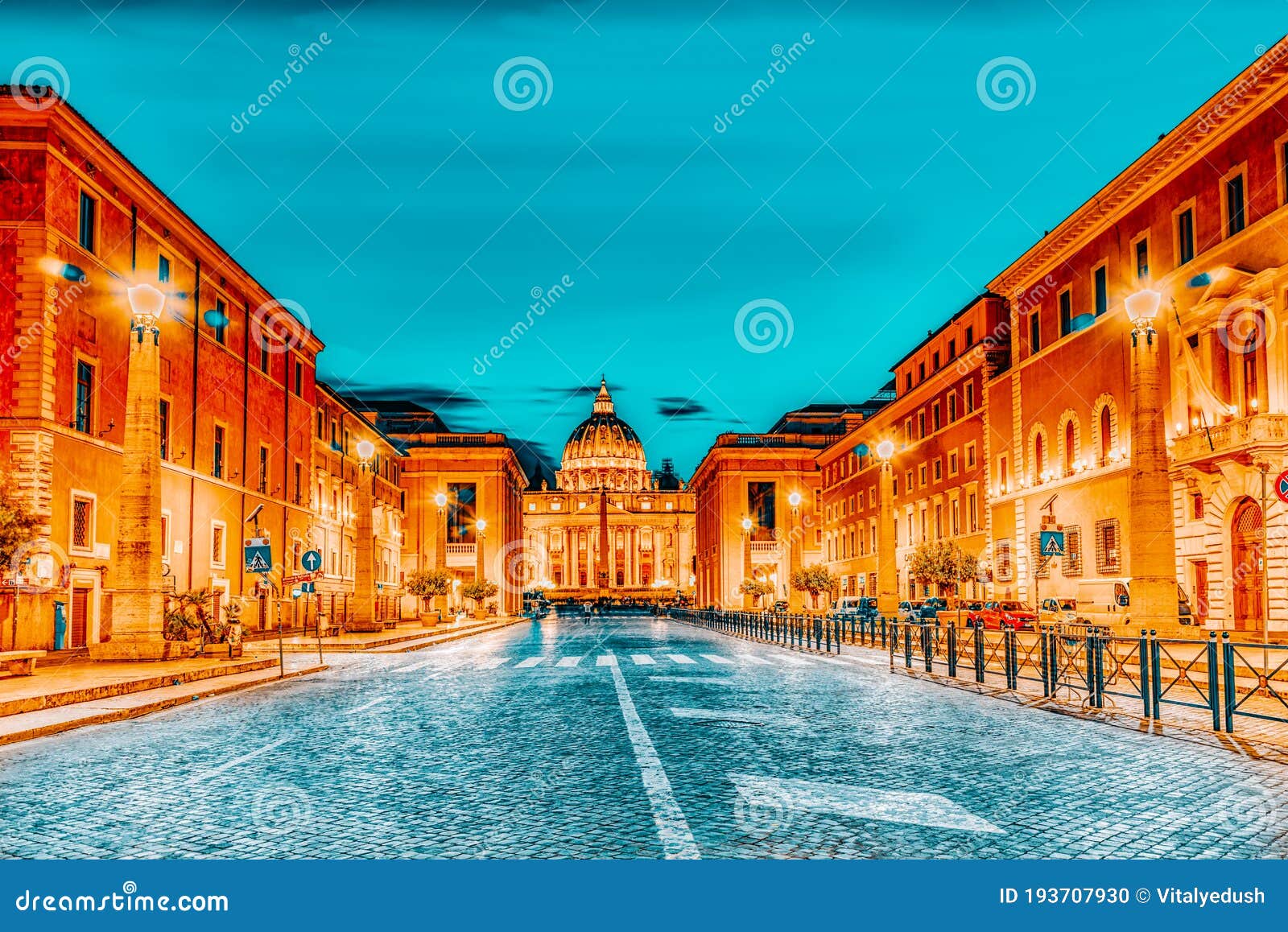 st. peter`s square and st. peter`s basilica, vatican city in the evening time from street conciliazione via della conciliazione