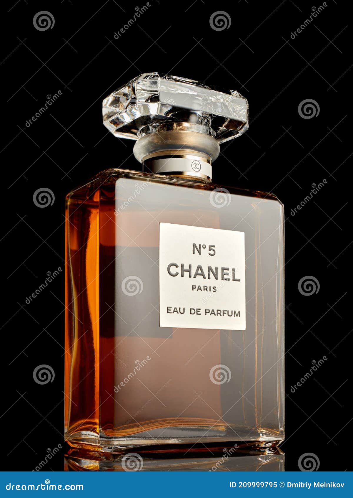 Bottle of Perfume Chanel â„– 5. on Black Background. Coco Chanel